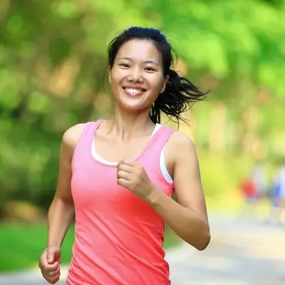 Person running and smiling